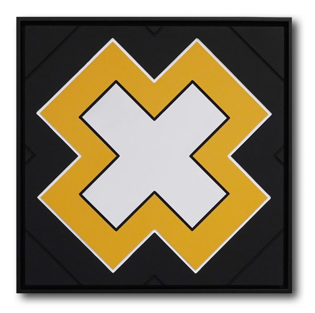 The letter X, carved and painted wood, in black, white and yellow