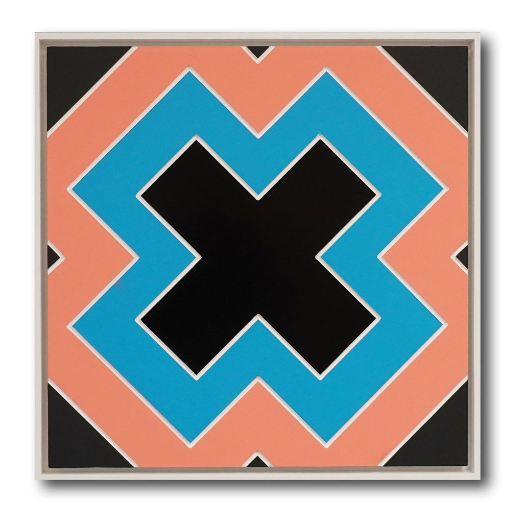 The letter X, carved and painted wood, in black, teal, white and salmon